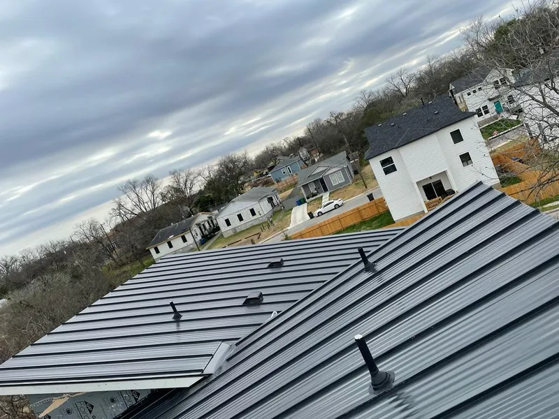 Standing seam metal roof panels with vents for Skylight Repair in Powell